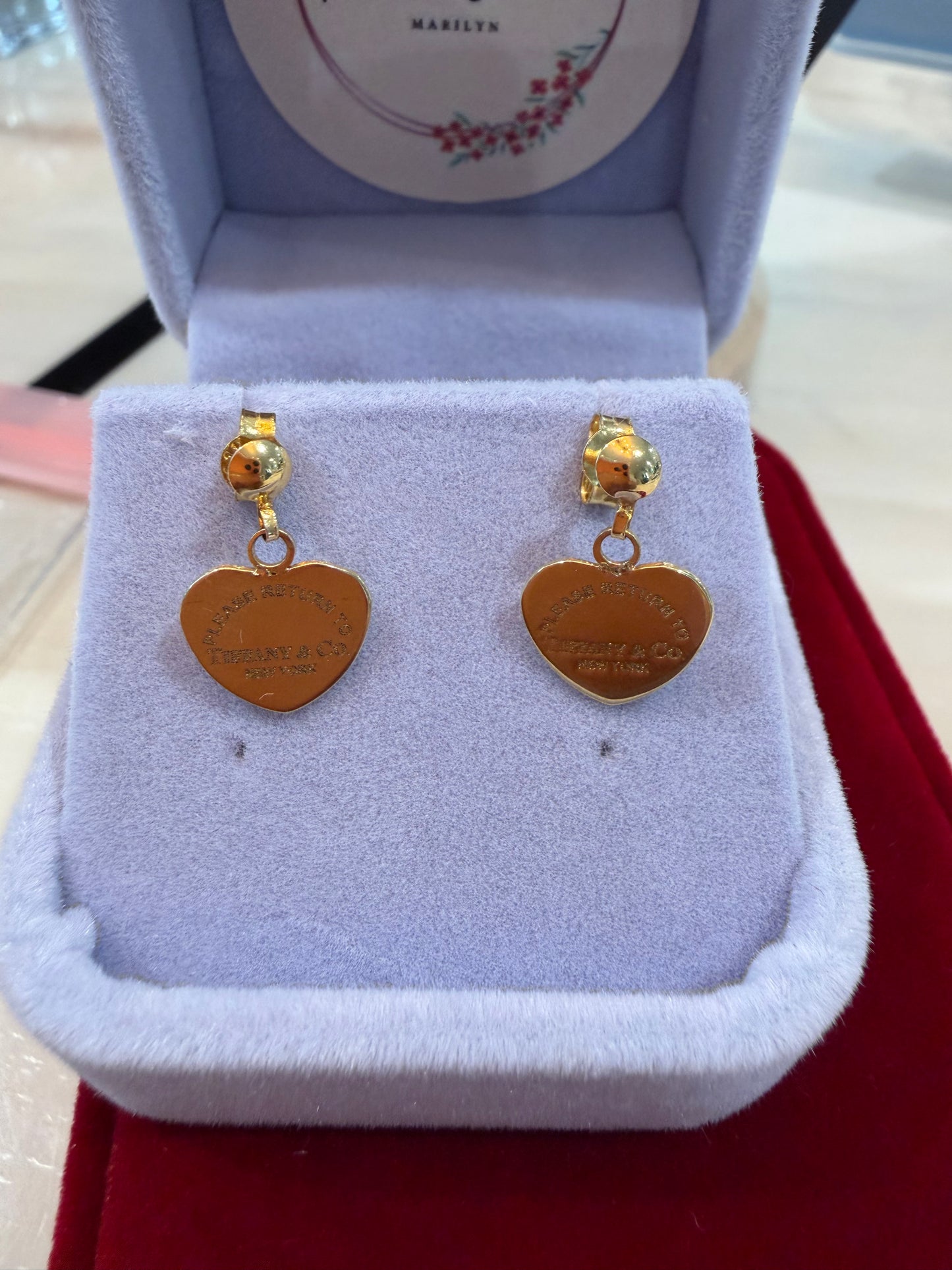 Stud dangling earring
