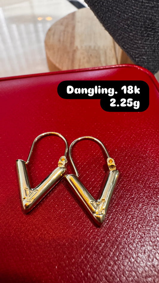 V earring dangling