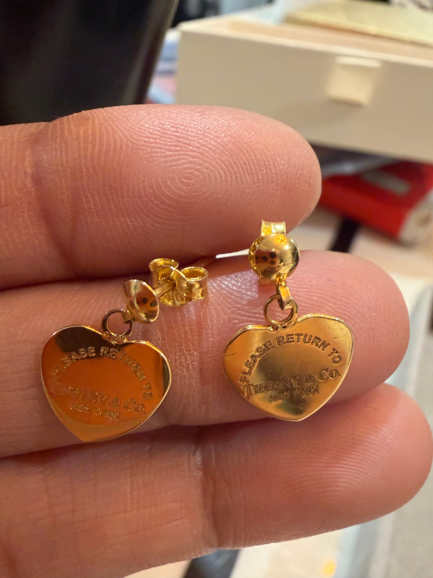 Stud dangling earring